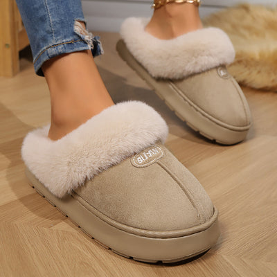 Cozy slippers providing warmth and comfort for indoor wear, perfect for relaxing at home in all seasons.