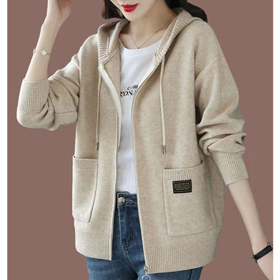 Stylish cozy hooded sweater perfect for cooler weather, blending comfort and elegant design seamlessly