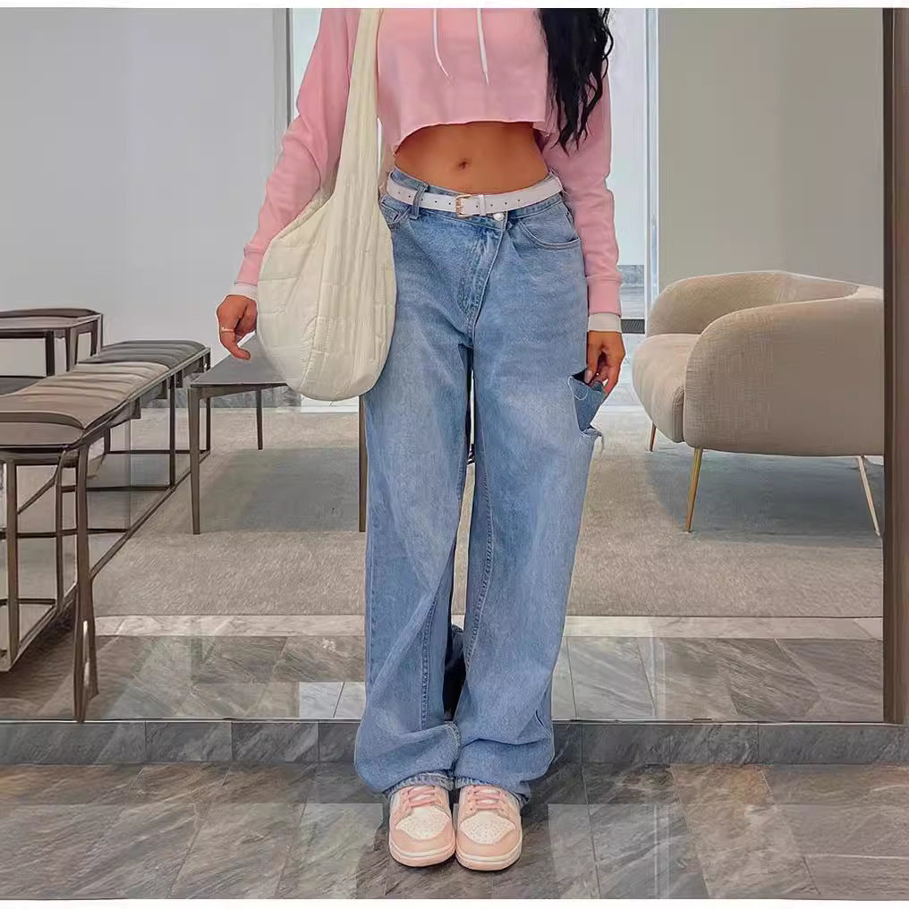 Stylish low waist jeans featuring loose hole design for a trendy and comfortable look