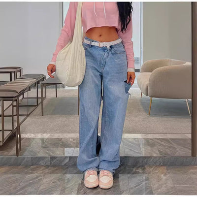 Stylish low waist jeans featuring loose hole design for a trendy and comfortable look