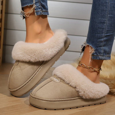Cozy slippers providing warmth and comfort for indoor wear, perfect for relaxing at home in all seasons.