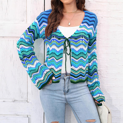 Rainbow Cadigan Christmas sweater showcasing festive colors and cozy holiday style for the winter season.
