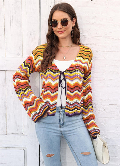 Rainbow Cadigan Christmas sweater showcasing festive colors and cozy holiday style for the winter season.