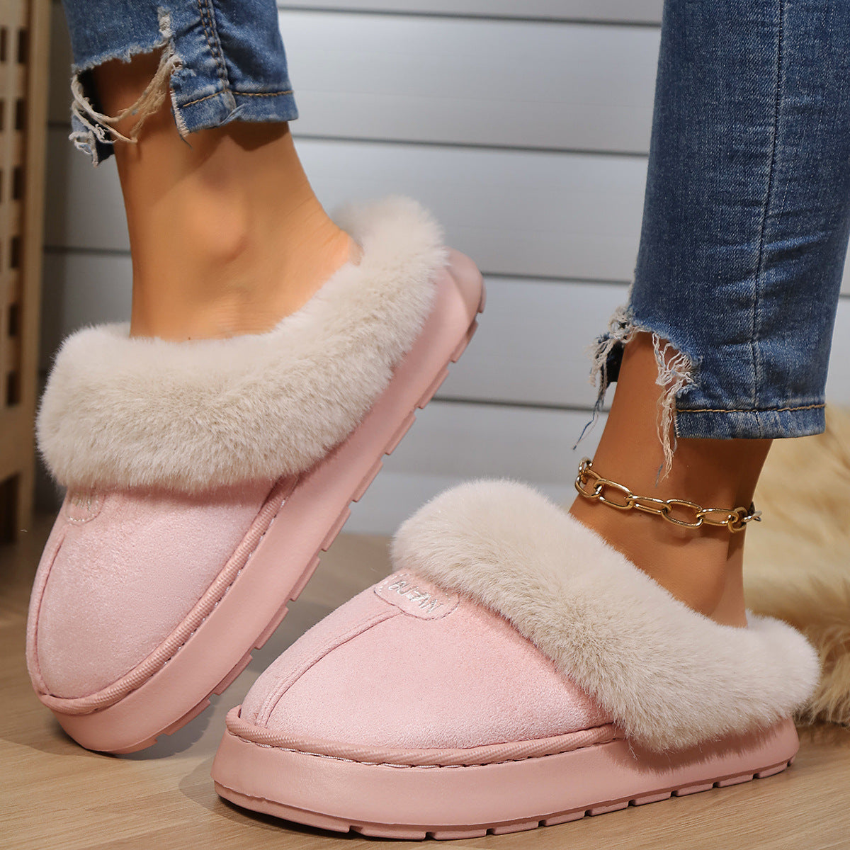 Cozy slippers providing warmth and comfort for indoor wear, perfect for relaxing at home in all seasons.