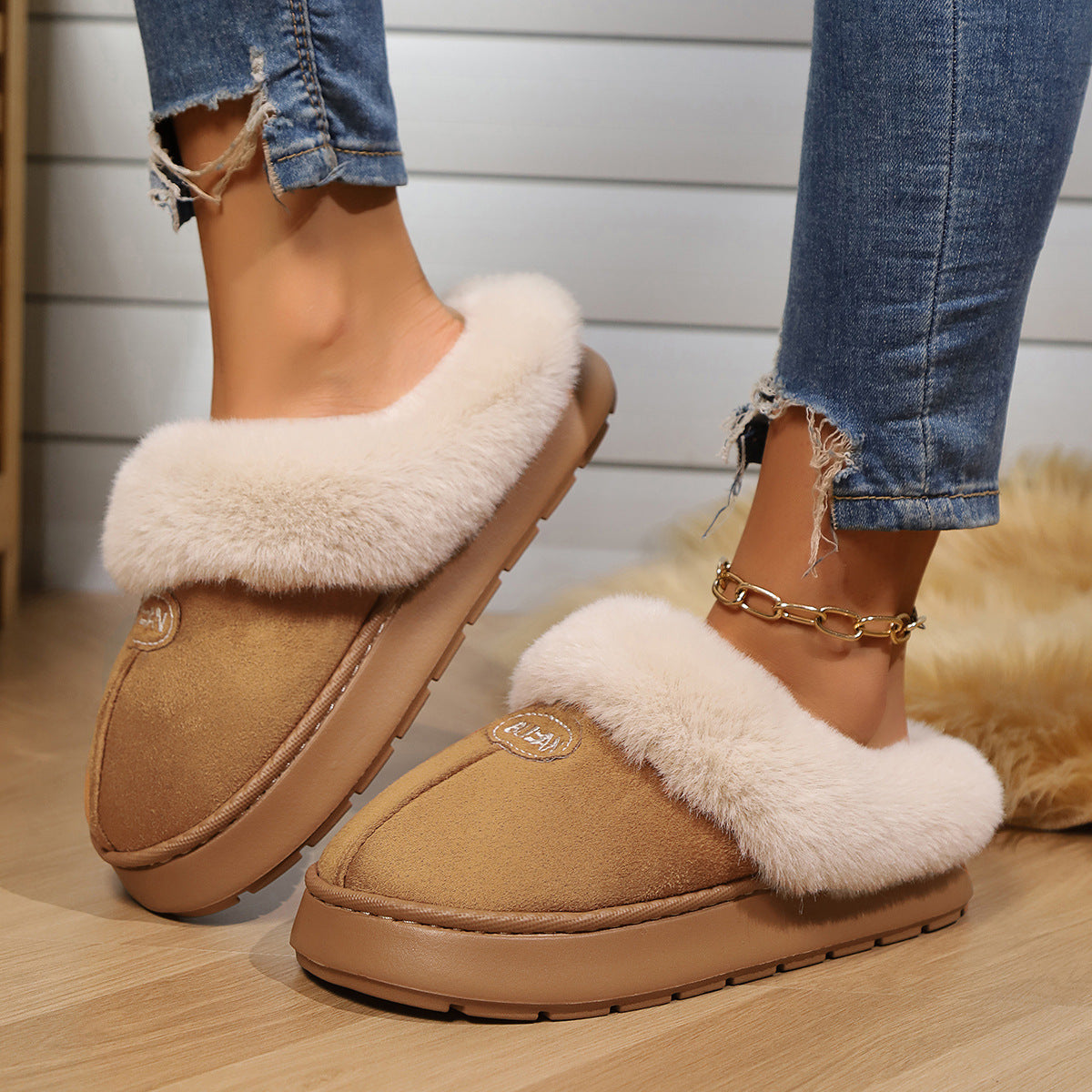 Cozy slippers providing warmth and comfort for indoor wear, perfect for relaxing at home in all seasons.