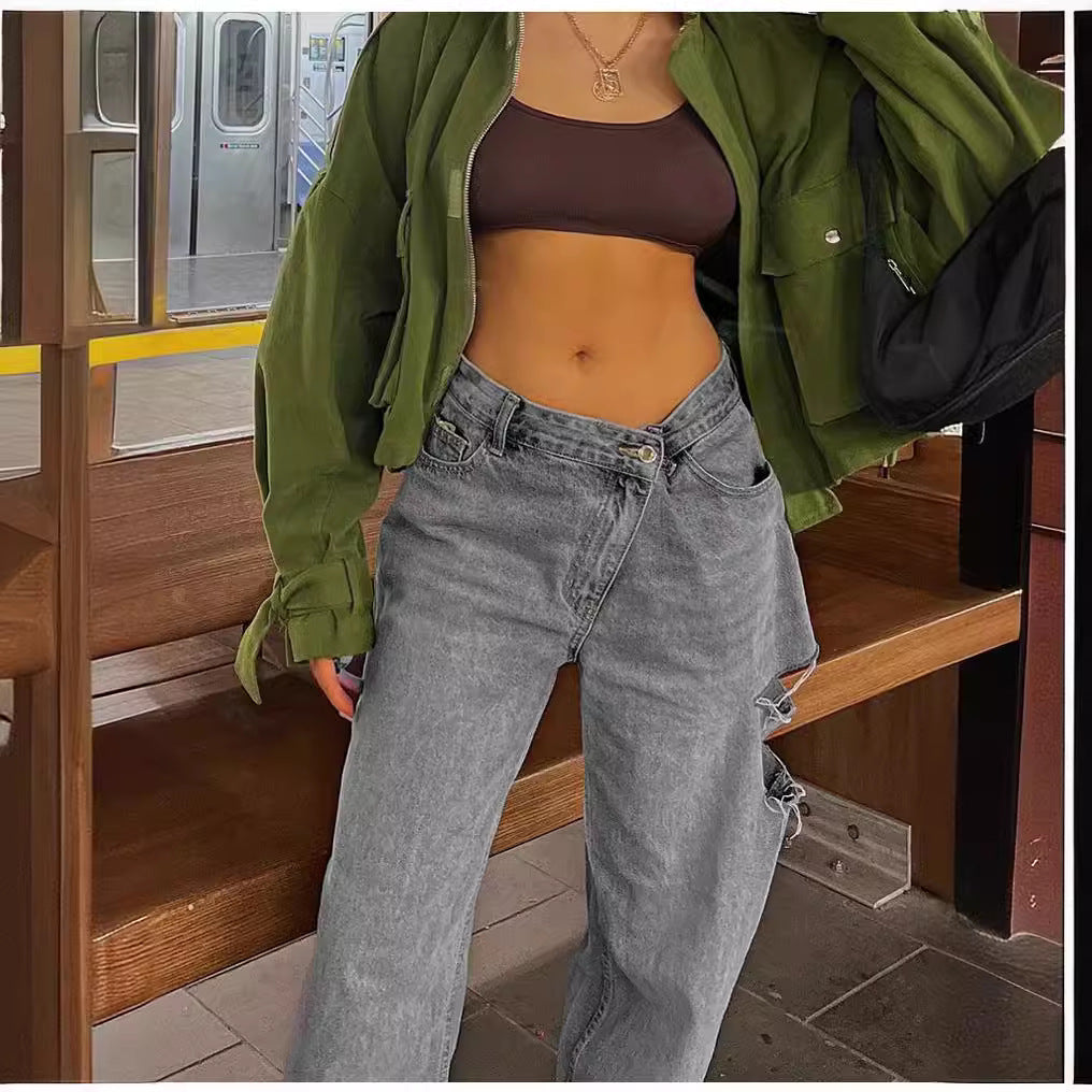 Stylish low waist jeans featuring loose hole design for a trendy and comfortable look