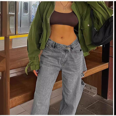 Stylish low waist jeans featuring loose hole design for a trendy and comfortable look