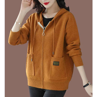 Stylish cozy hooded sweater perfect for cooler weather, blending comfort and elegant design seamlessly