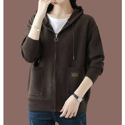 Stylish cozy hooded sweater perfect for cooler weather, blending comfort and elegant design seamlessly