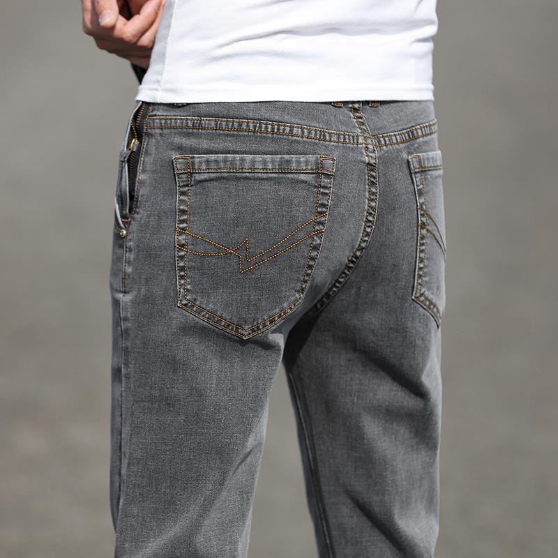 Stylish smoky gray jeans perfect for autumn casual wear, combining comfort and seasonal elegance