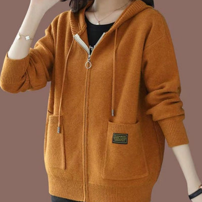 Stylish cozy hooded sweater perfect for cooler weather, blending comfort and elegant design seamlessly
